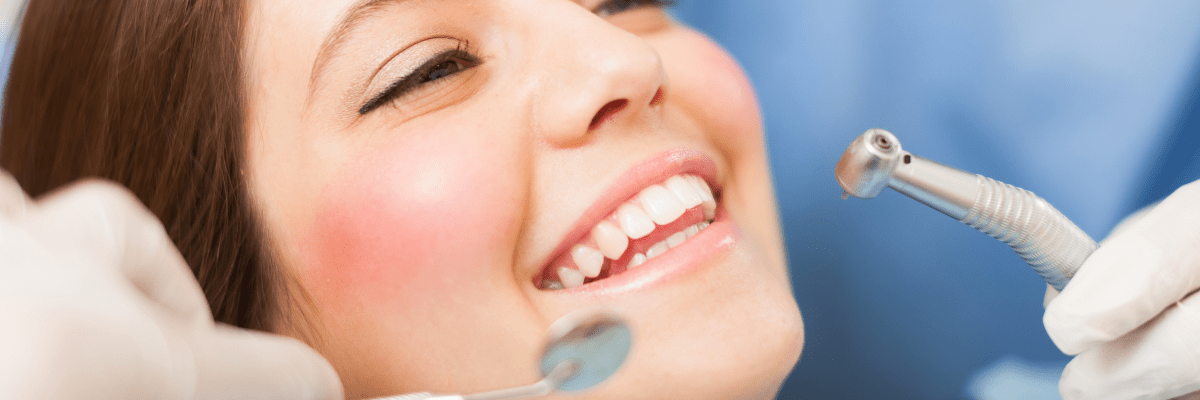 Dental Image of female patient getting a teeth cleaning