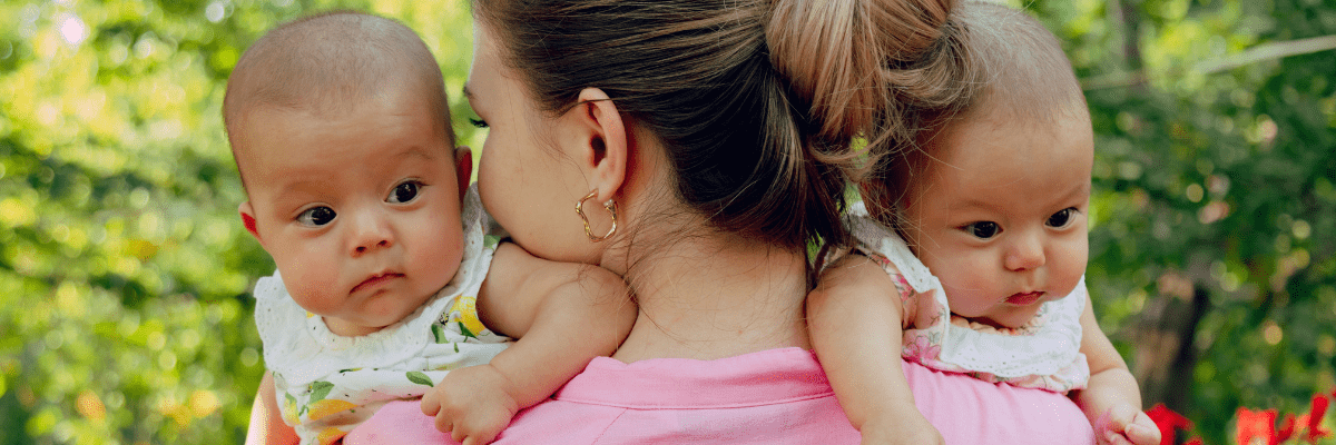 WIC Image of a Mom and Two Babies