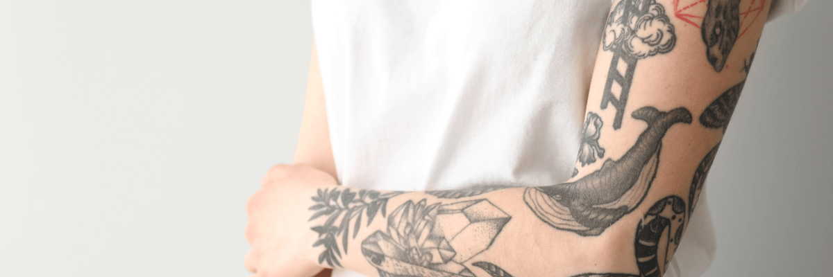 Tattooing & Body Art Image of tattooed arms.